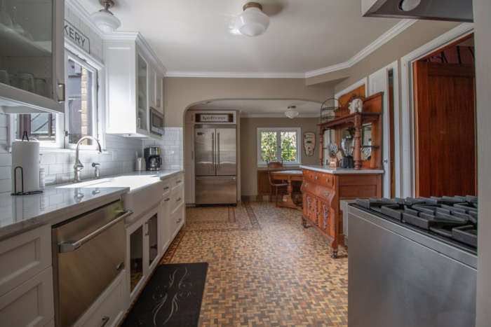 old farmhouse kitchen with tile floor painted cabinets