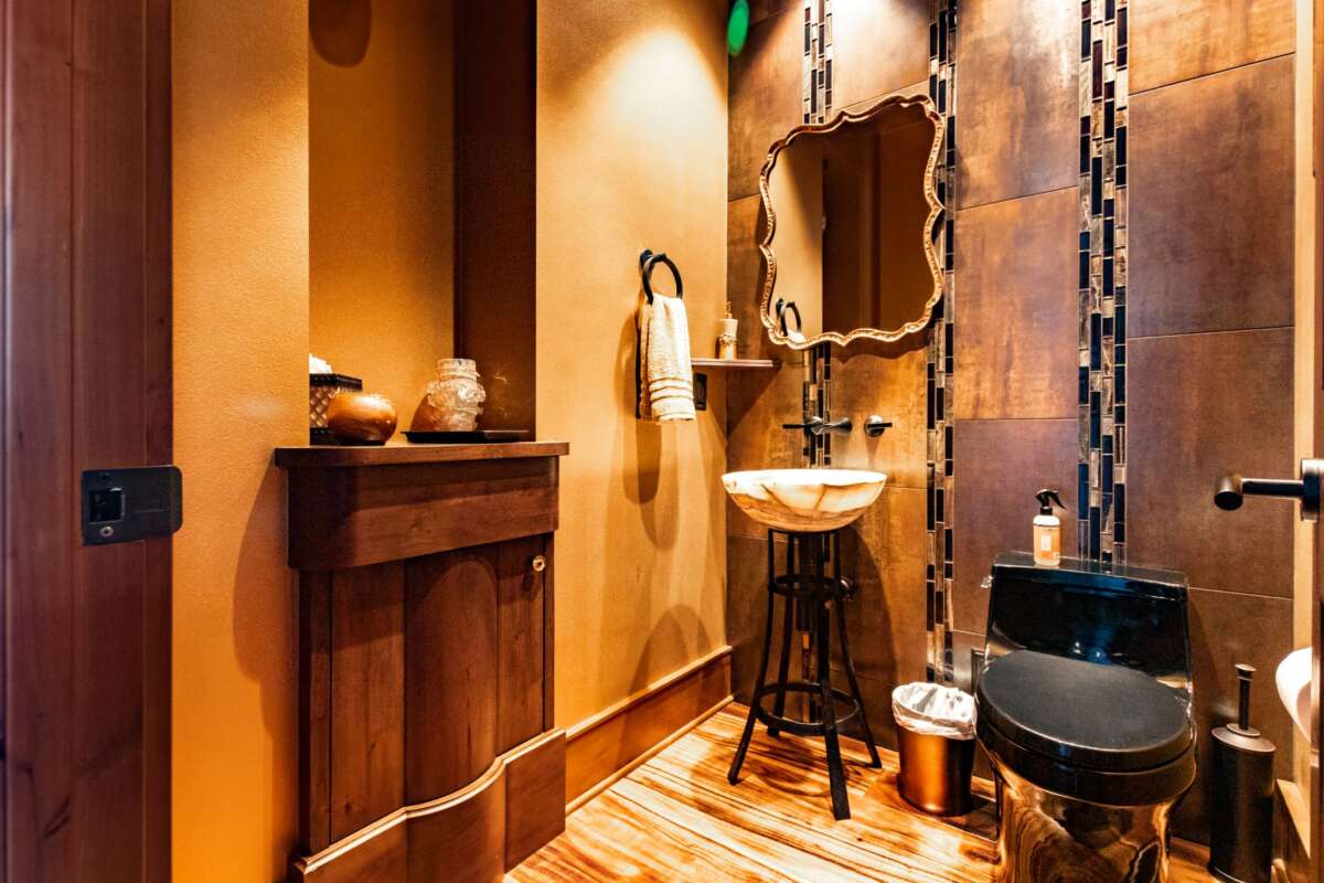 luxury bathroom with wood cabinet