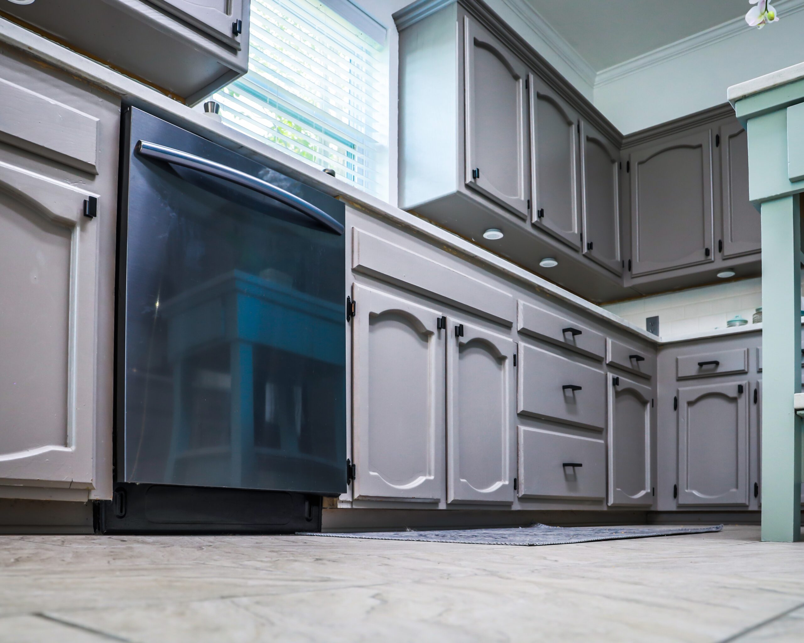 Kitchen with gray painted cabinets