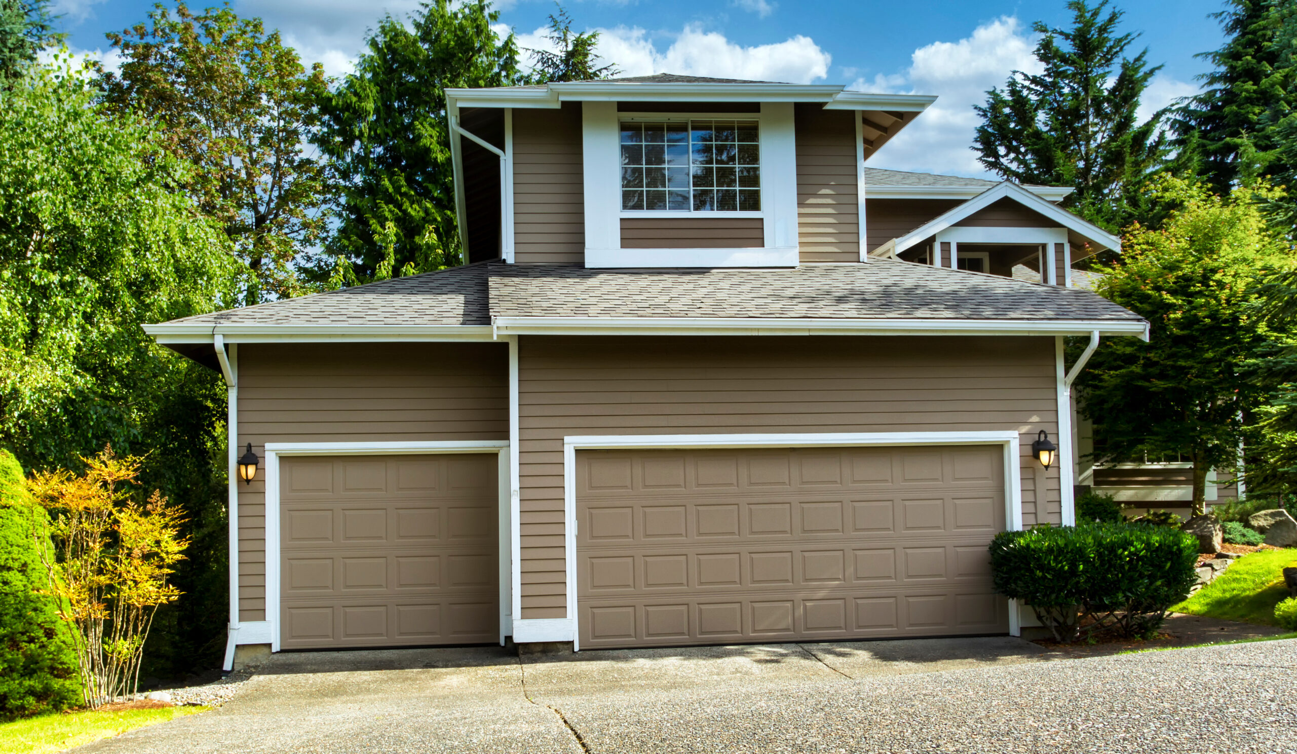 Freshly painted brown two-story house