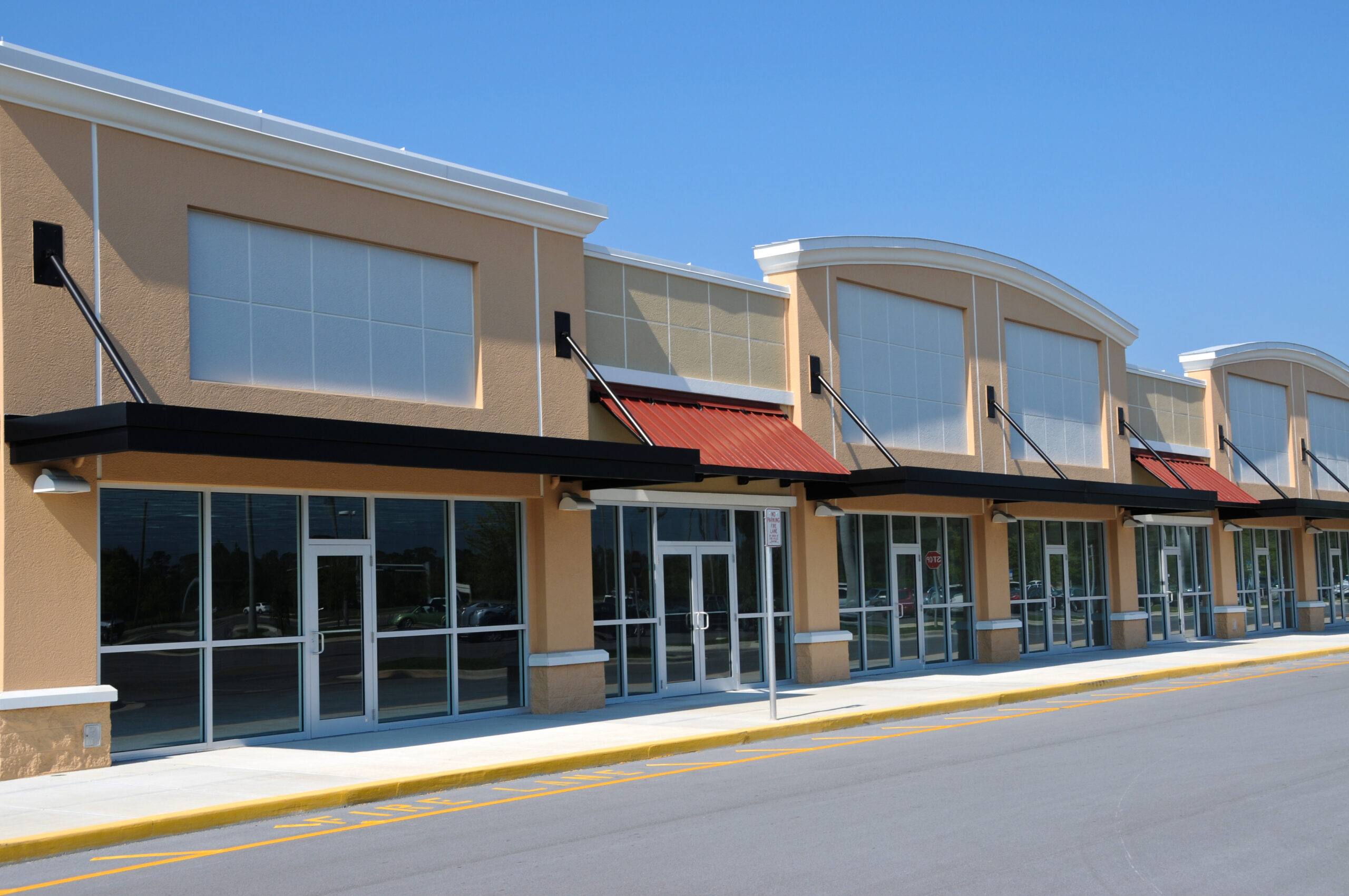Line of storefronts in shopping center