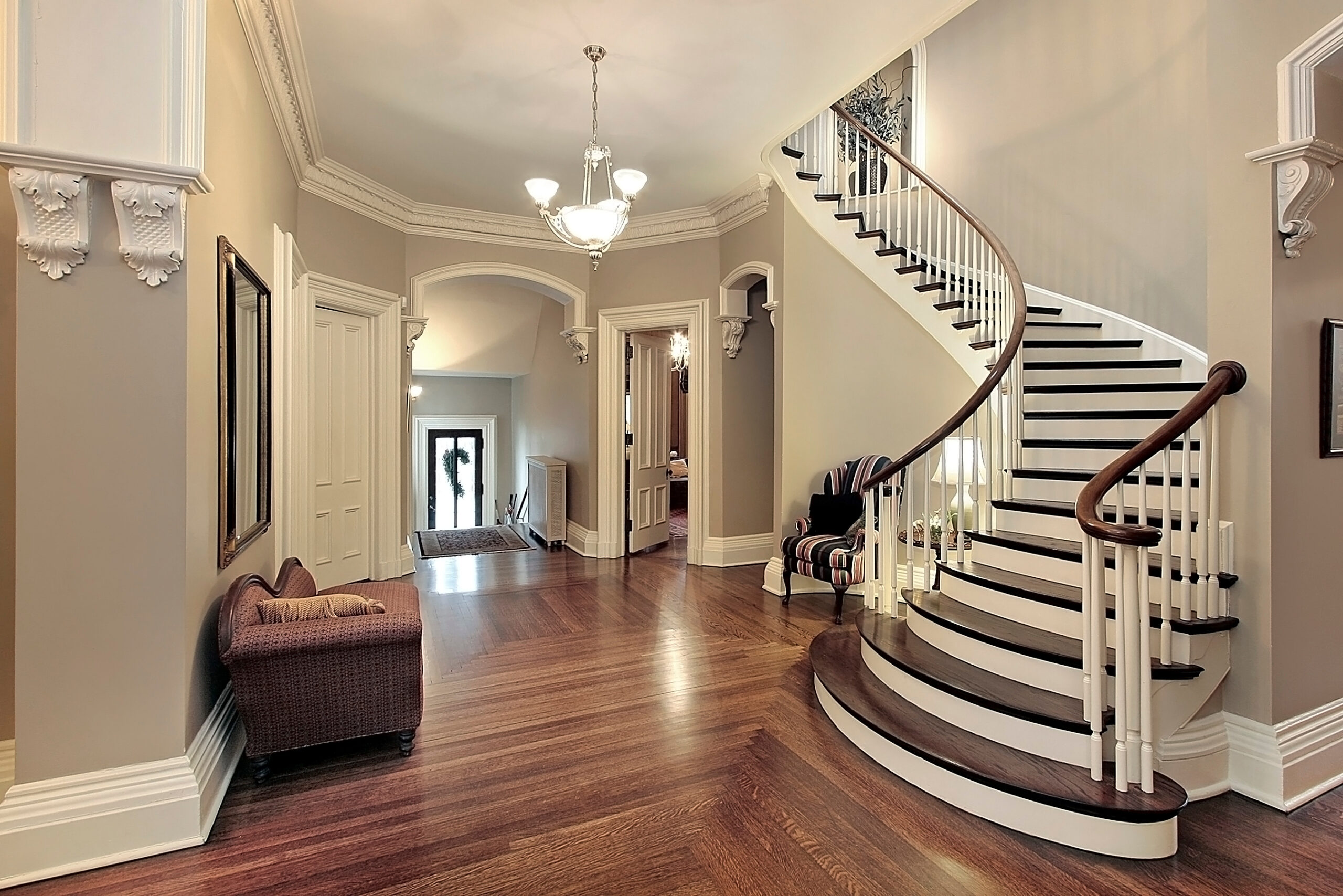 Foyer with a spiral staircase